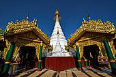 The main white washed stupa inside the cluster of pagodas that make up the Kakku pagoda complex. Shan State, Burma (Myanmar). 